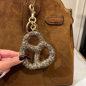 Coach brown crystal pretzel charm #preppy